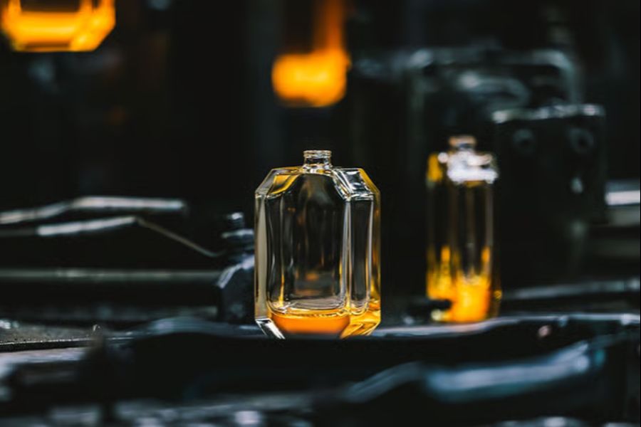 Glass flacons on a filling line