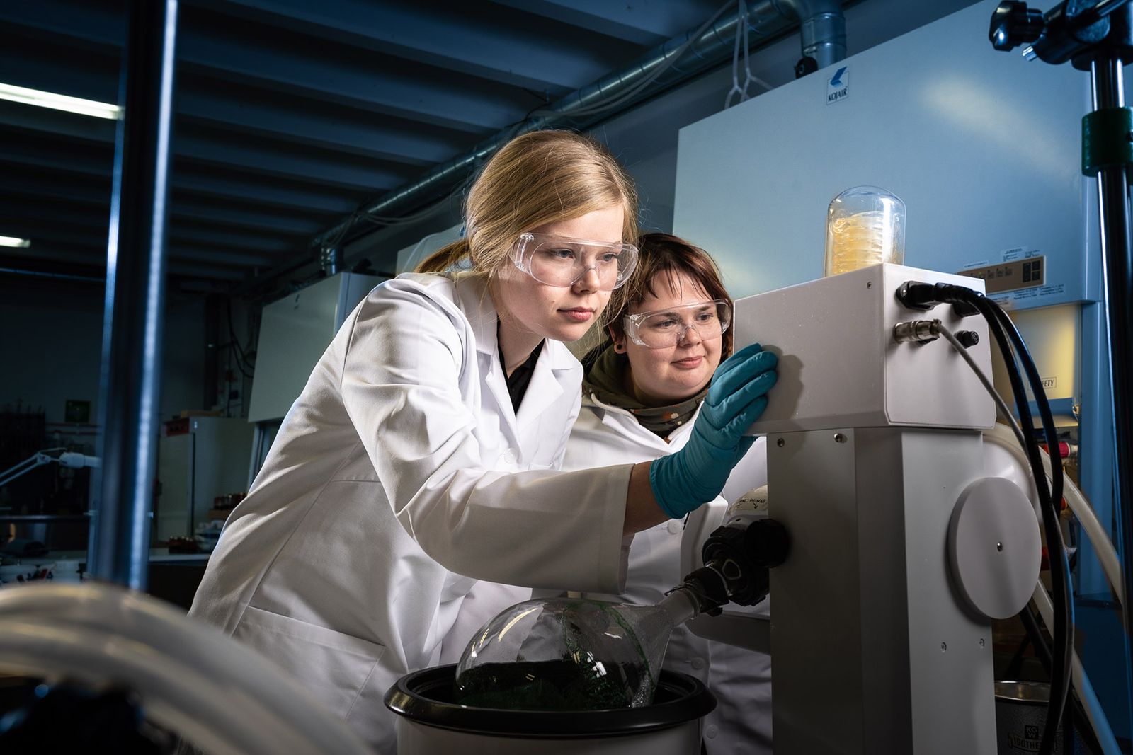 Two Brightplus chemists at work in the lab in Oulu
